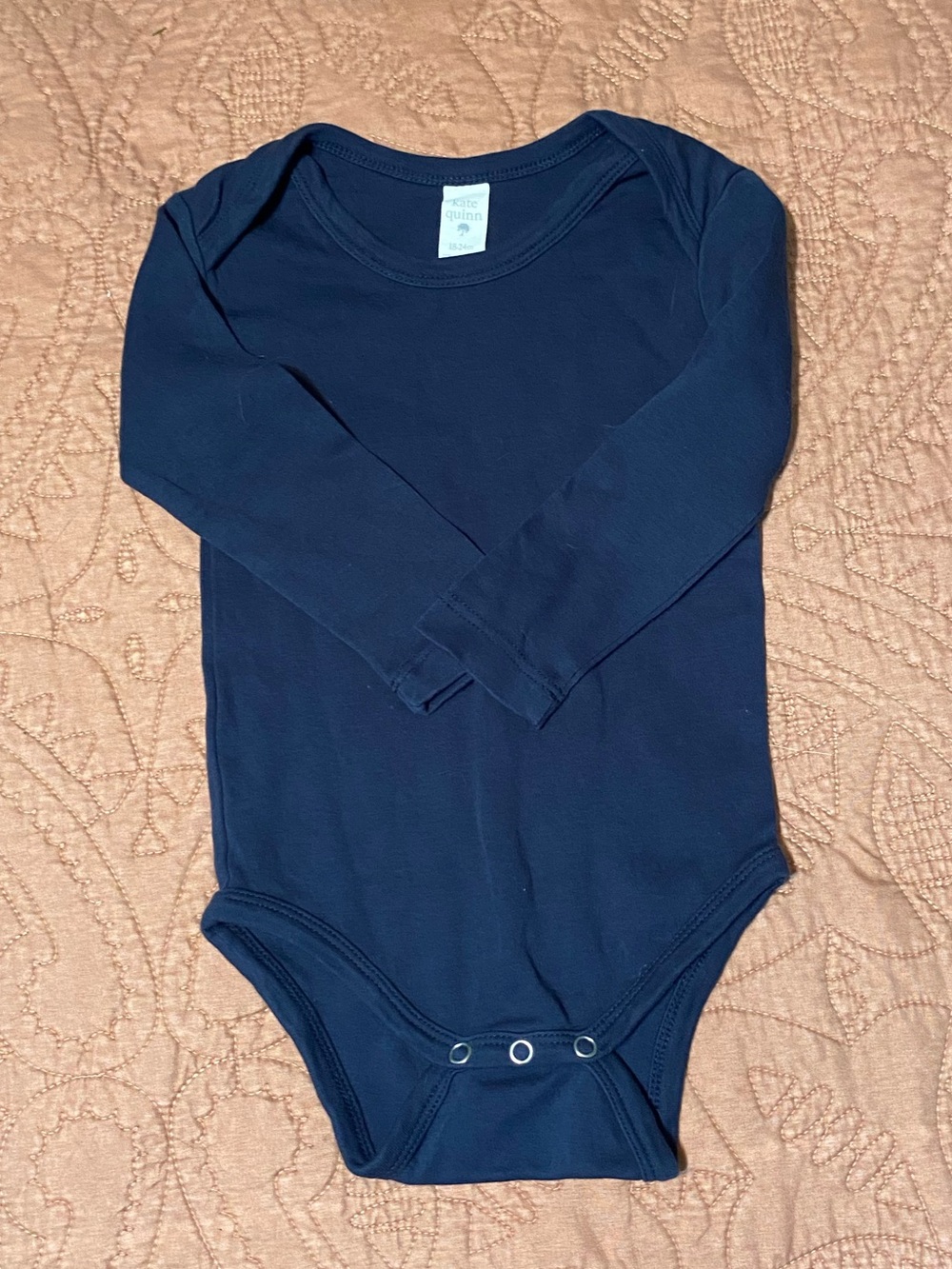 Kate Quinn navy onesie